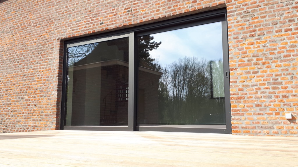 Bardage en bois et terrasse réalisés par MD Menuiserie
